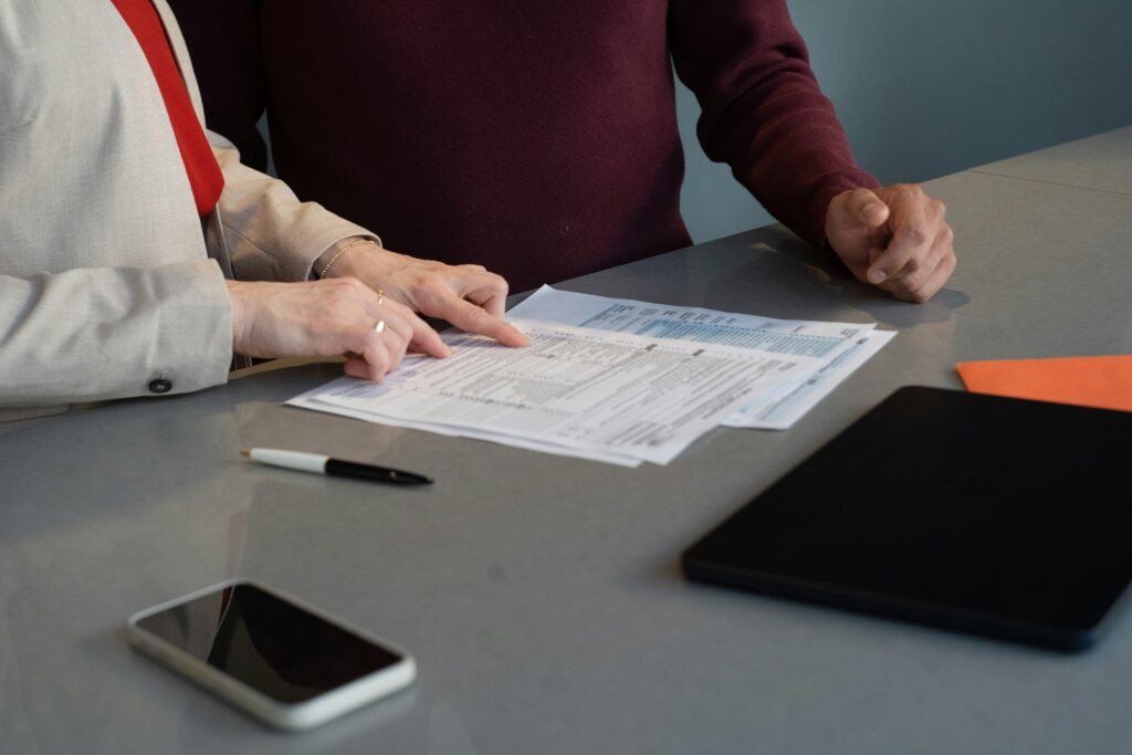 Adult child reviewing parent's medical bills and looking for options